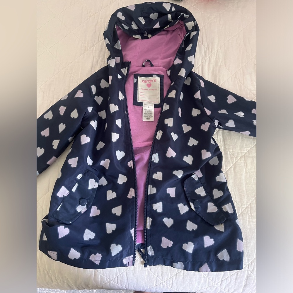 Girls rain jacket size 6 with COOL COLOR CHANGE